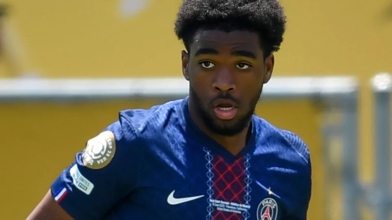 Player wearing PSG kit during a match