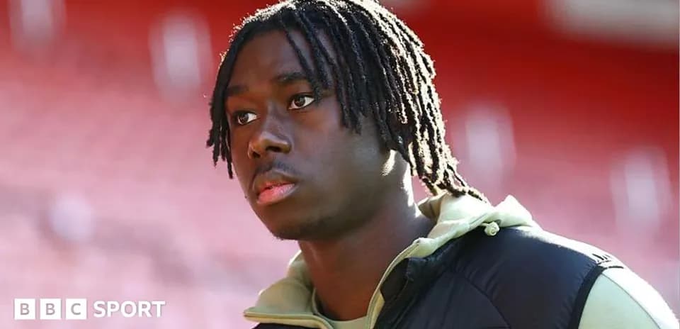 Player walking in stadium before the match