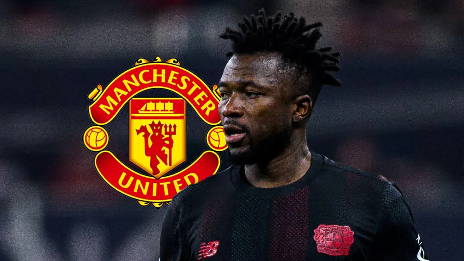 Player in black jersey with Manchester United logo background