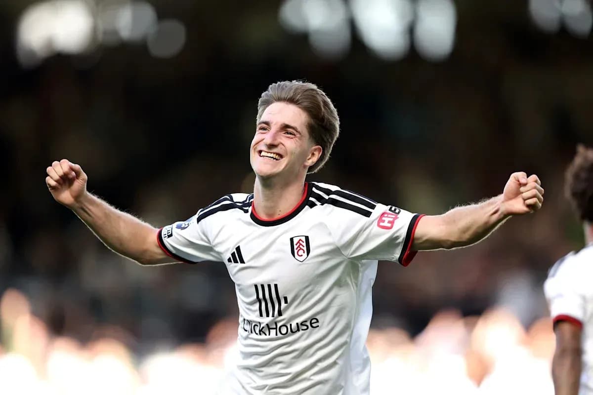Fulham player celebrating a goal on the pitch