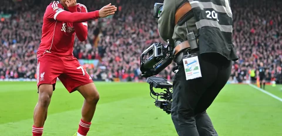 Liverpool player celebrating during match against Fulham