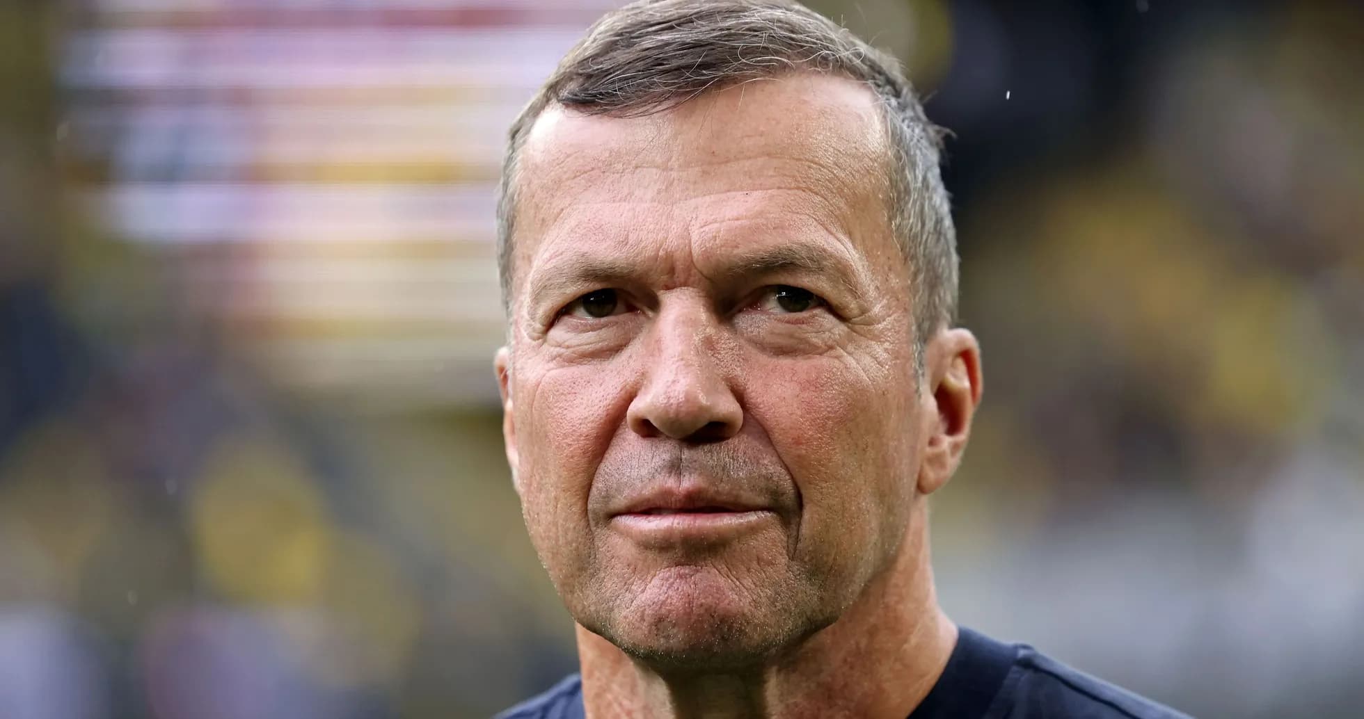 Coach looking directly at the camera during match