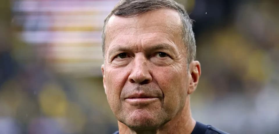 Coach looking directly at the camera during match