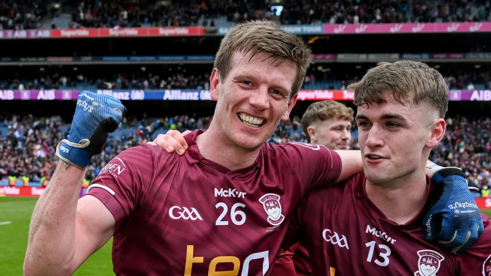 Two players celebrating after a match victory