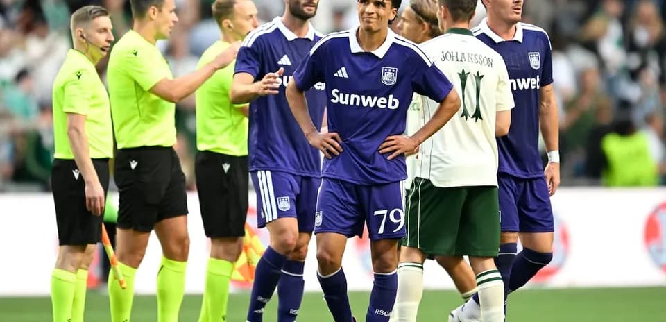 Players and referees discussing during match
