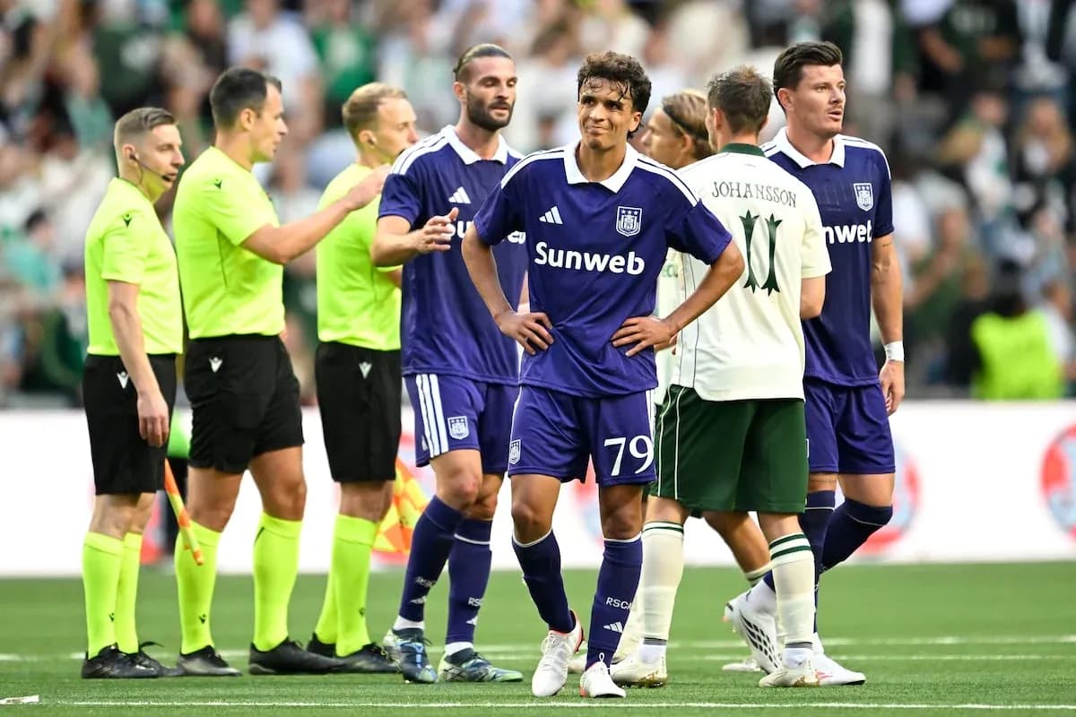 Players and referees discussing during match