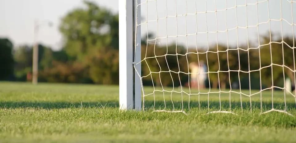 Close-up of a soccer goal on the field