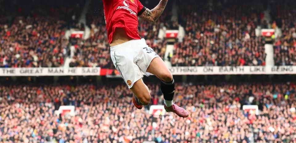Manchester United player celebrating during match