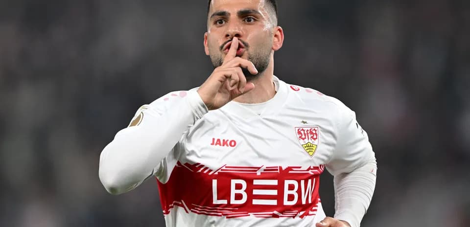 Player celebrating with finger to lips after scoring