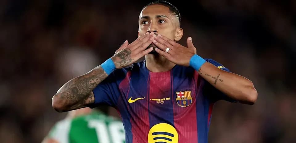 Player celebrating with hand gestures on the field