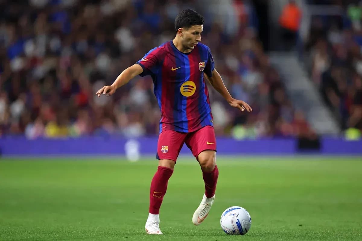 Player dribbling ball during match for Barcelona