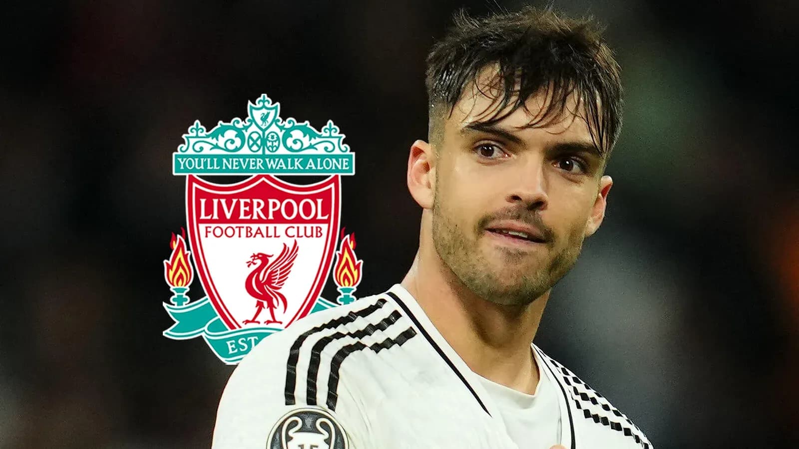Player in foreground with Liverpool FC logo background