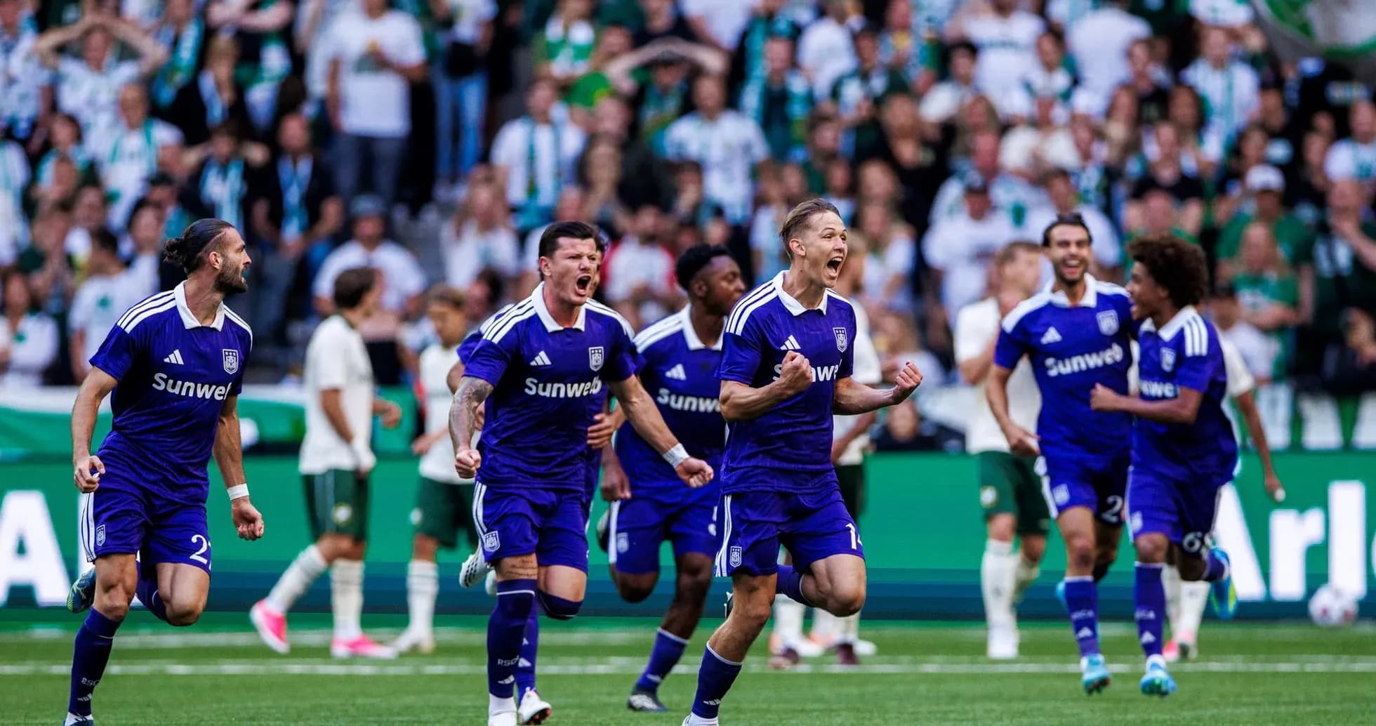 Anderlecht players celebrating a goal in UEFA match