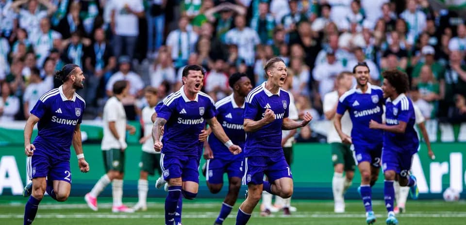 Anderlecht players celebrating a goal in UEFA match