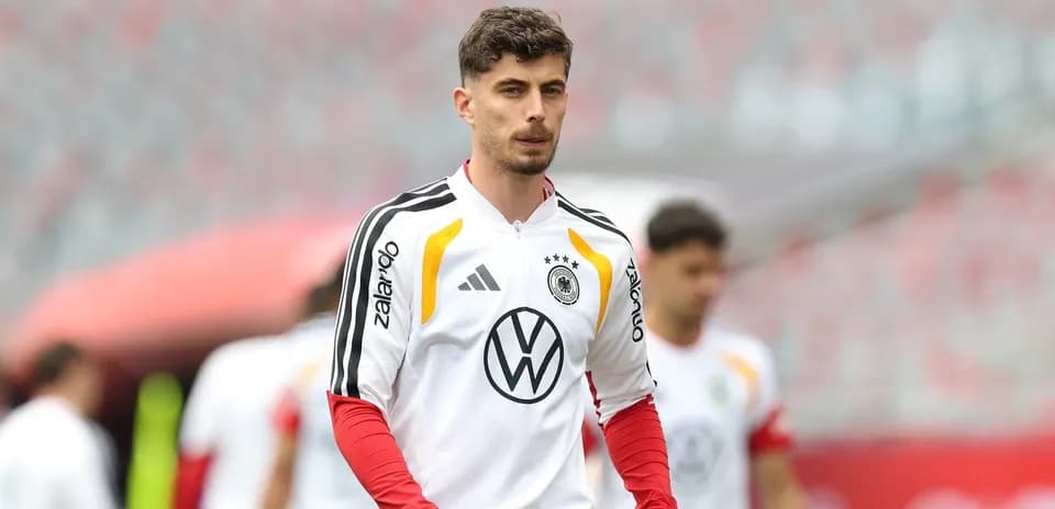 Player in Germany national team training kit on pitch