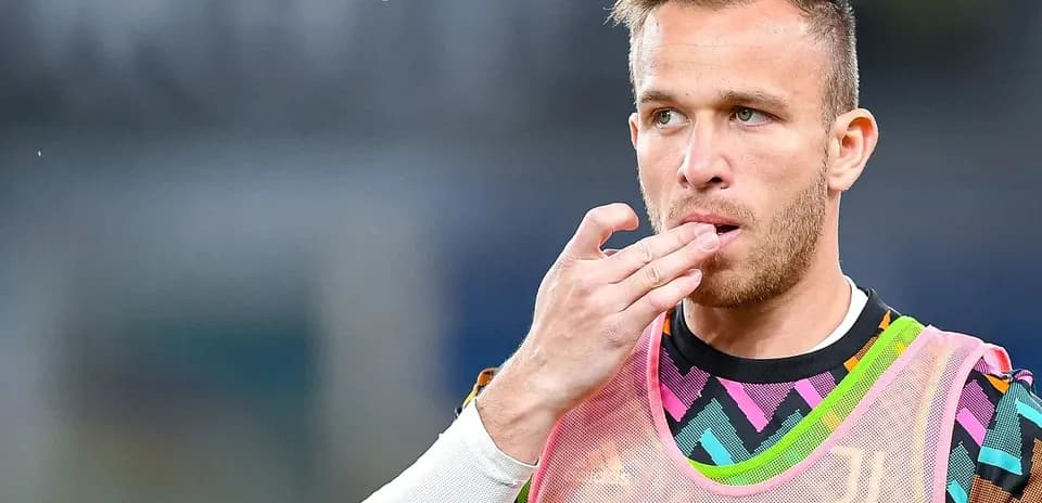 Player adjusting his mouthguard during warm-up