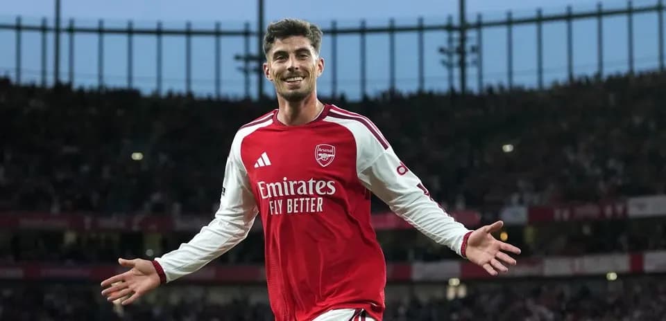Player celebrating after scoring a goal for Arsenal