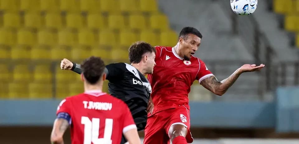 CSKA Sofia player contesting a header during match
