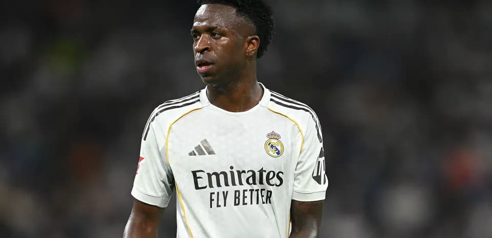 Vinícius Júnior wearing Real Madrid kit on field