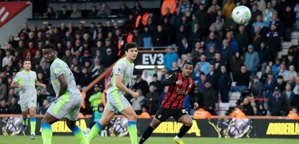 Manchester City players defending against Bournemouth