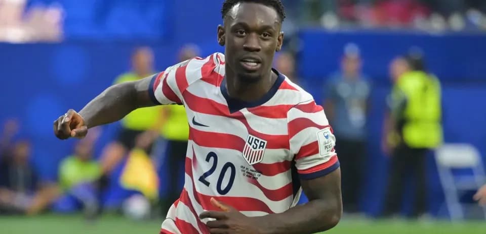 Player celebrating after scoring a goal for USA