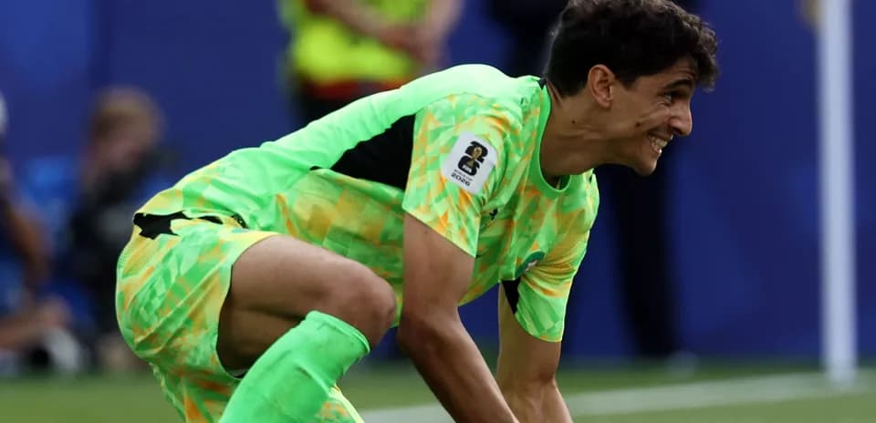 Goalkeeper preparing to make a save during match