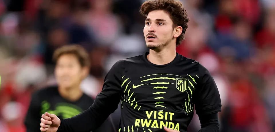 Player warming up in Atletico Madrid training gear