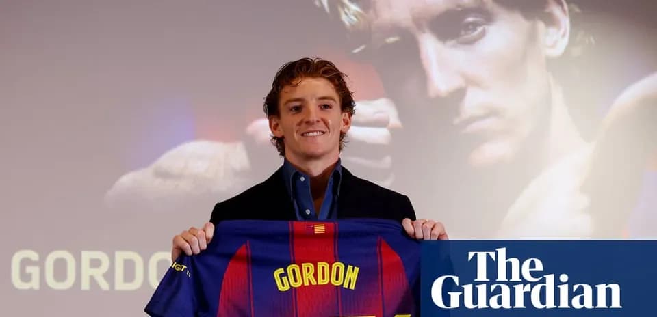Player presenting Barcelona jersey at press conference