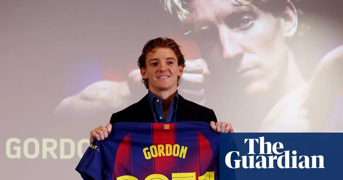 Player presenting Barcelona jersey at press conference