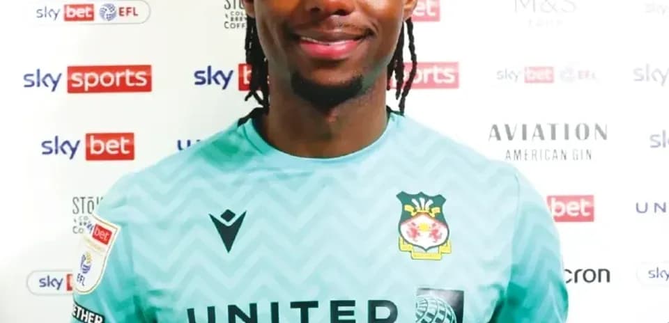 Goalkeeper posing in team kit during press event
