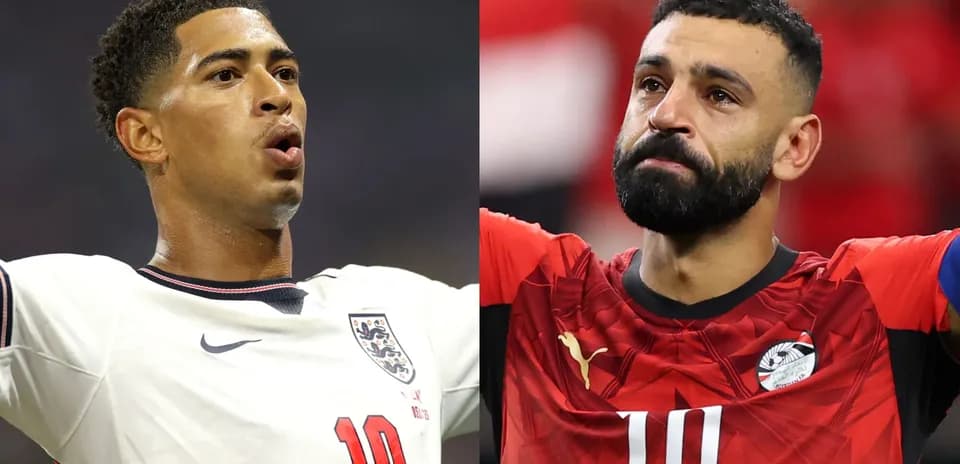 Two football players celebrating and reacting during match