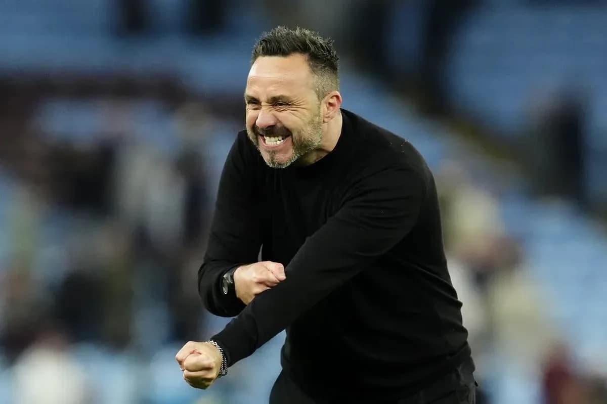 Coach celebrating passionately on the sideline