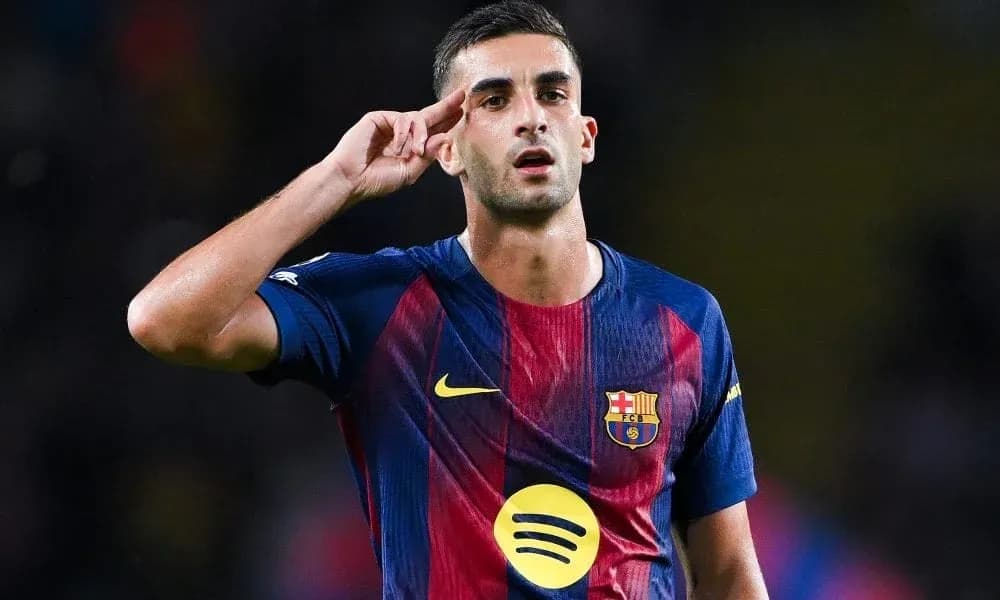 Player saluting during match in Barcelona jersey