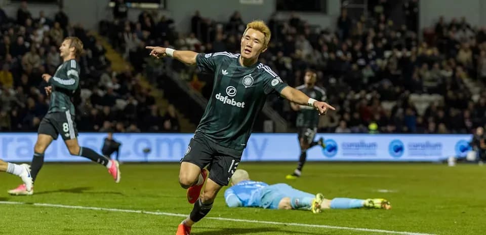 Player celebrating after scoring a goal in match