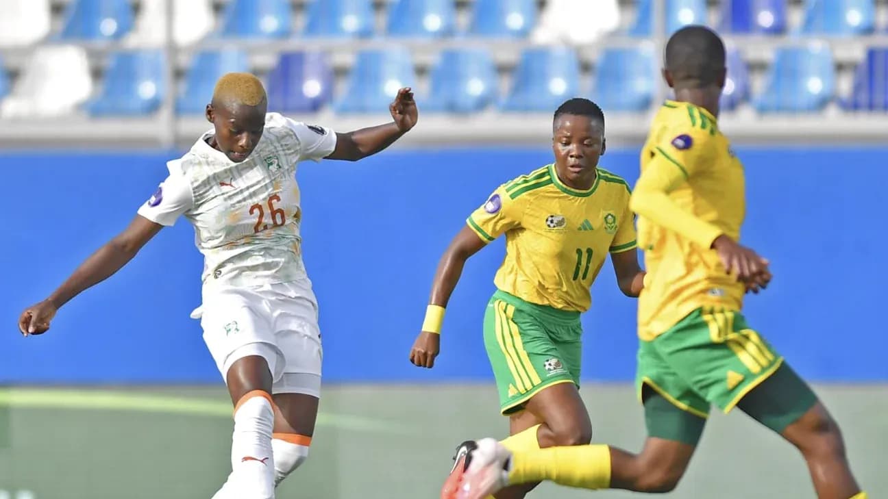 Player 26 kicking the ball during match action