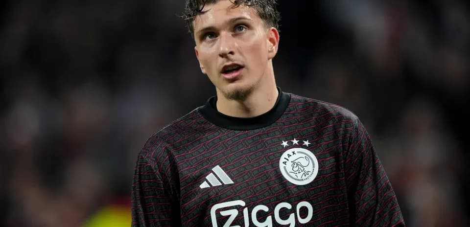 Goalkeeper in Ajax kit during a match