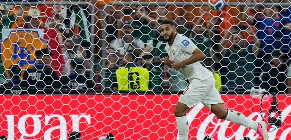 Moroccan player celebrating goal in World Cup match