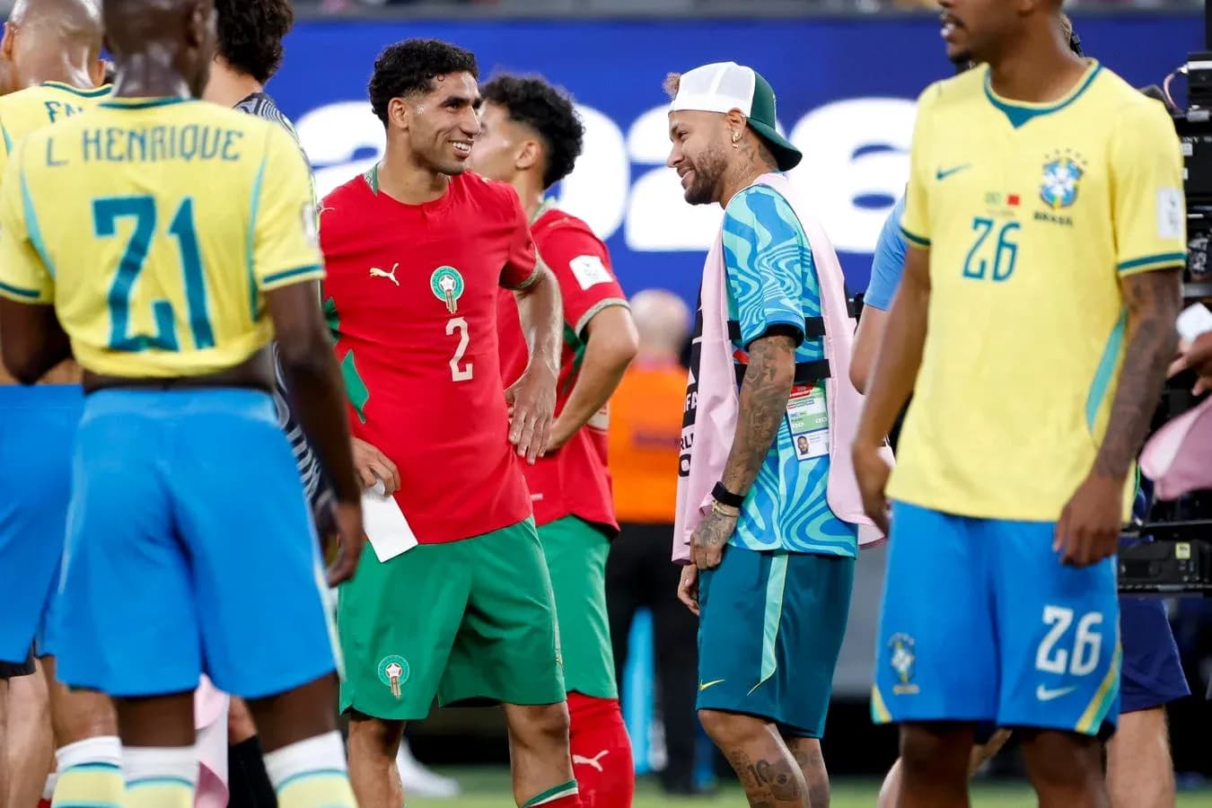 Players from Morocco and Brazil interacting on the field