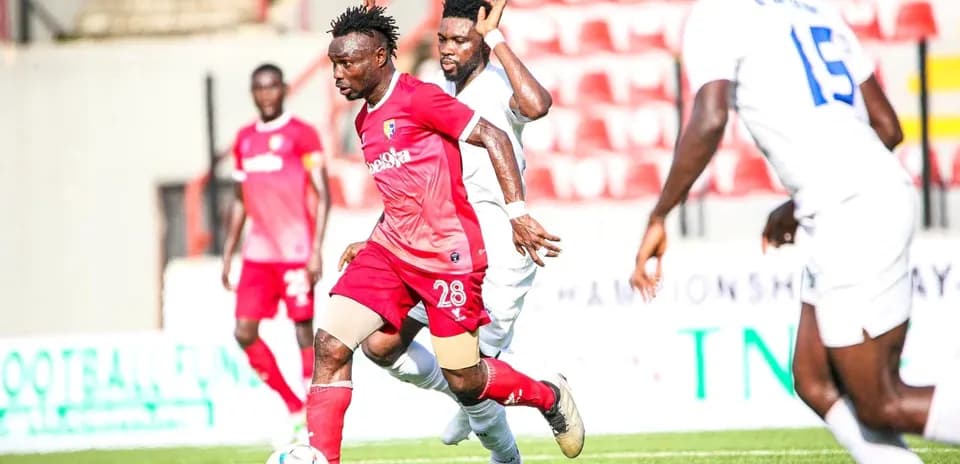 Player dribbling the ball during Katsina United match