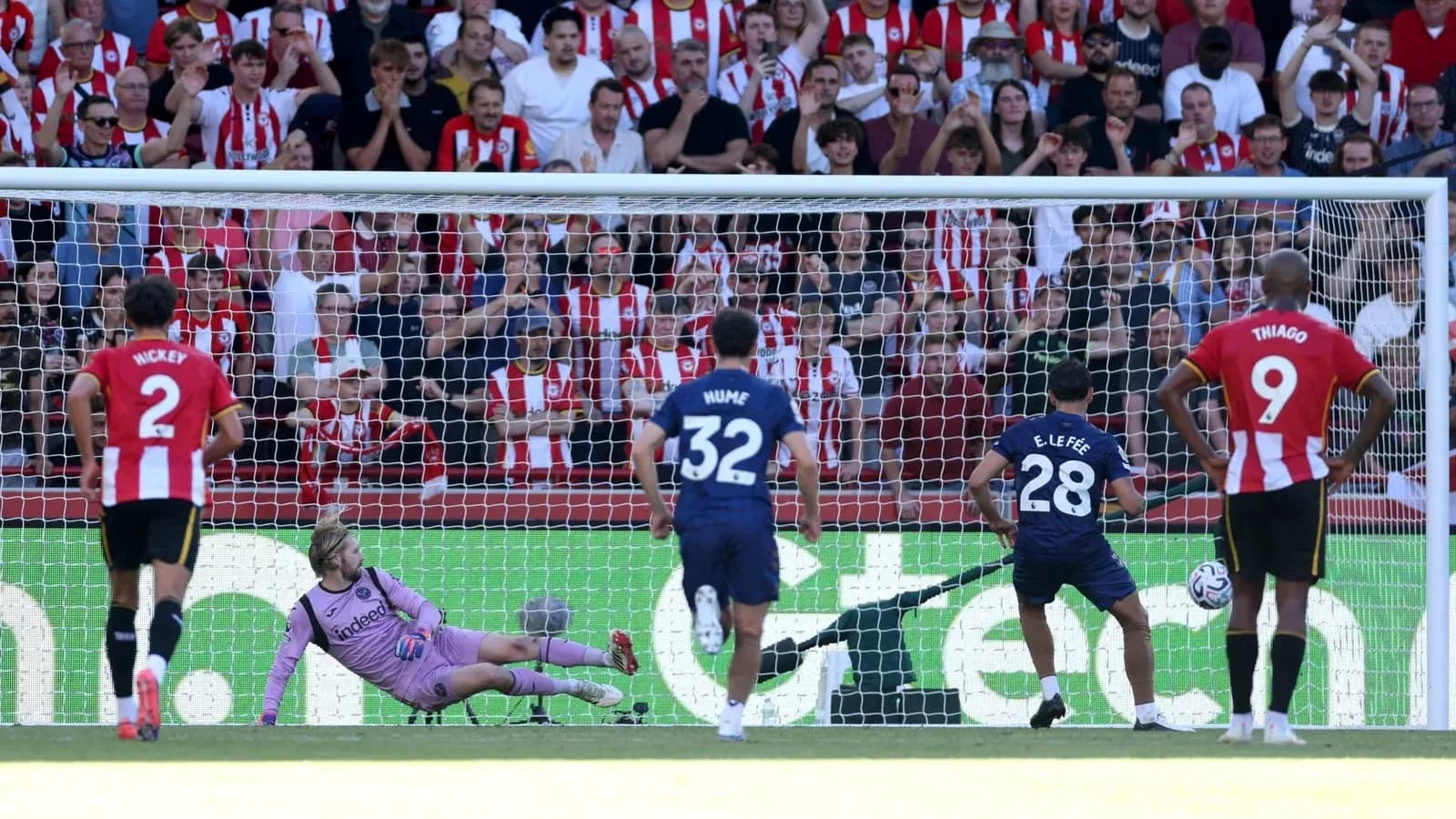 Player taking a penalty kick during match