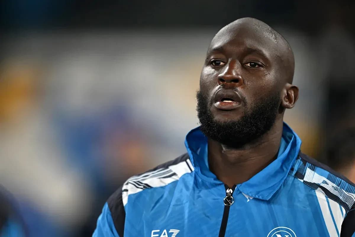 Player in blue training kit before match