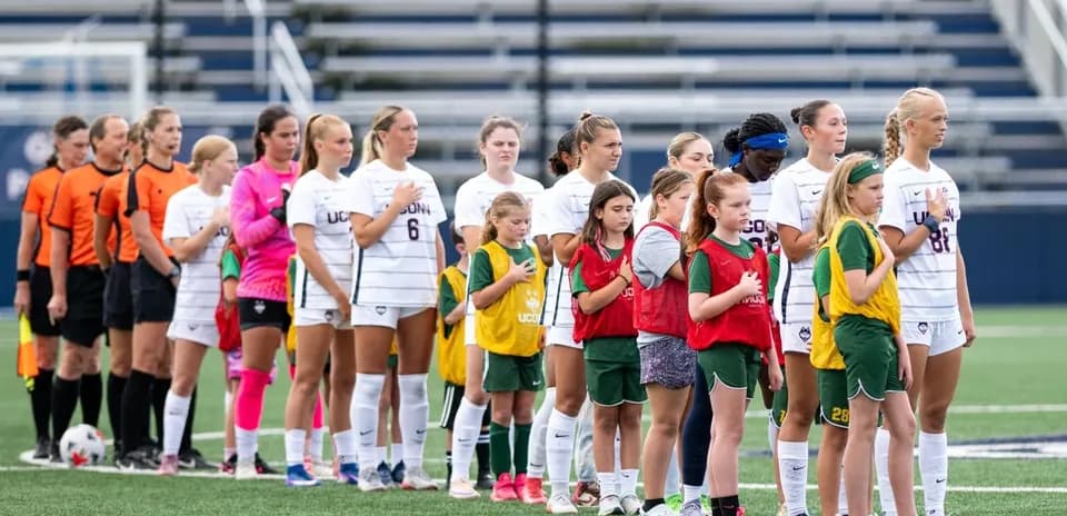 UConn women's soccer team lined up before match