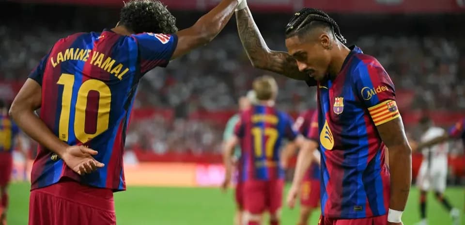 Players celebrating during Sevilla vs Barcelona match
