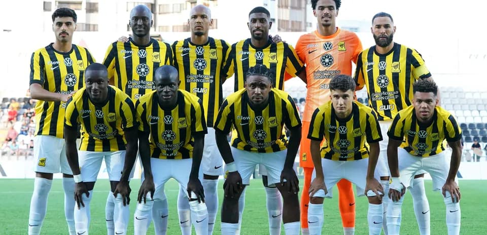 Football team posing for a group photo before match