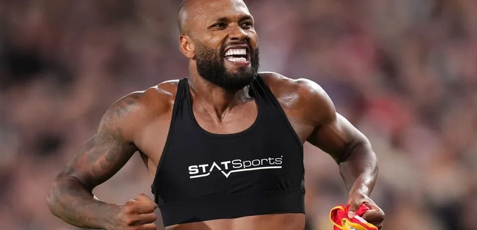 Athlete celebrating with jersey during competition