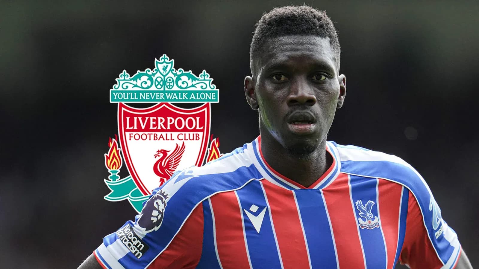 Crystal Palace player in front of Liverpool logo