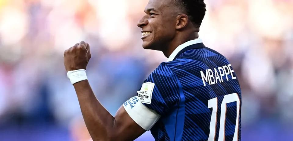 Player celebrating in France national team jersey