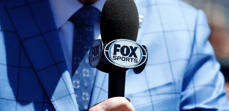 Close-up of FOX Sports microphone and suit