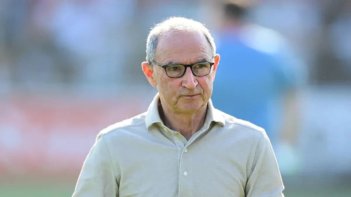 Coach walking on the sidelines during a match