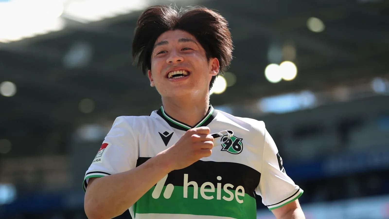 Player celebrating a goal on the pitch